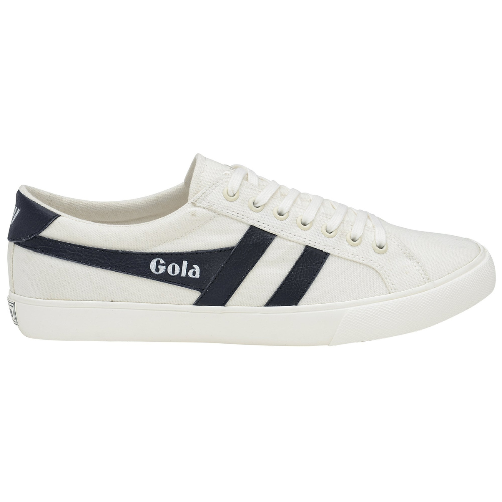 A men's varsity trainer, white with contrasting black detailing and wingflashes. Gola's logo is white and is contrasting against the black wingflash on which it sits.