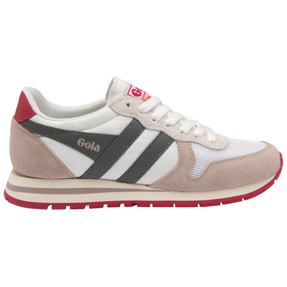 Gola women's daytona trainer. It features a white background however various patchwork colours throughout, including peach fabric backs and fronts, which frame the mesh toe area. The wingflash is black, and Gola's logo contrasts in it with its peachy colouring. The shoe's sole is red, as it the detailing on the shoes back upper and logo on the tongue.