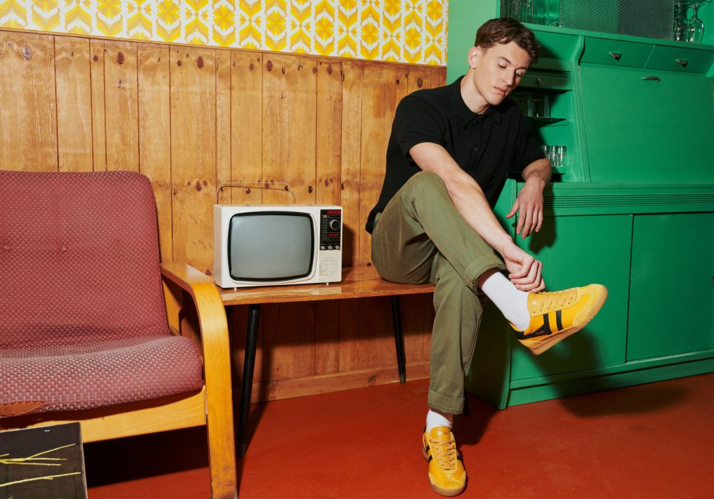 Man wearing Yellow Tornado trainers